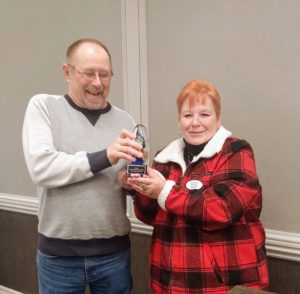 2020 Relentless Badger Award presented to Ken Arneson by Bobbi Craig